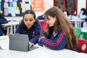 two students working on Ipad
