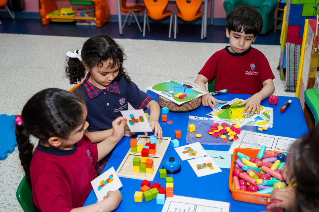 Students playing puzzle and LEGO